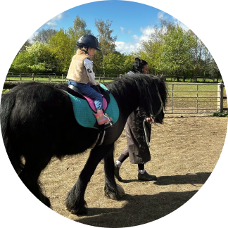 Riding on a lead rein (in walk only)